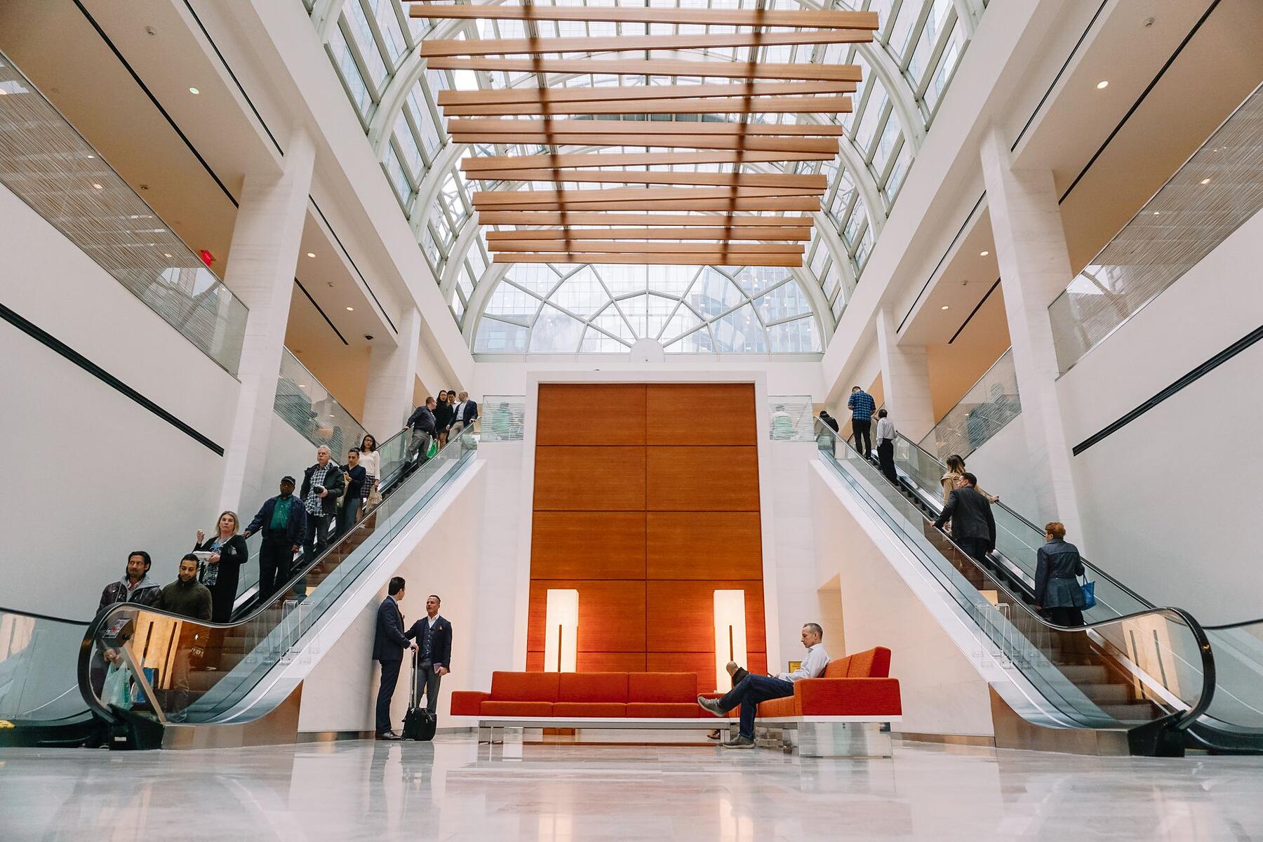 Escalators rising through the atrium of a convention center